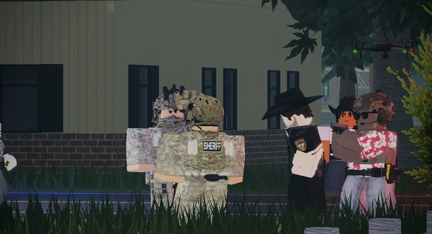 Members gathered outside a station